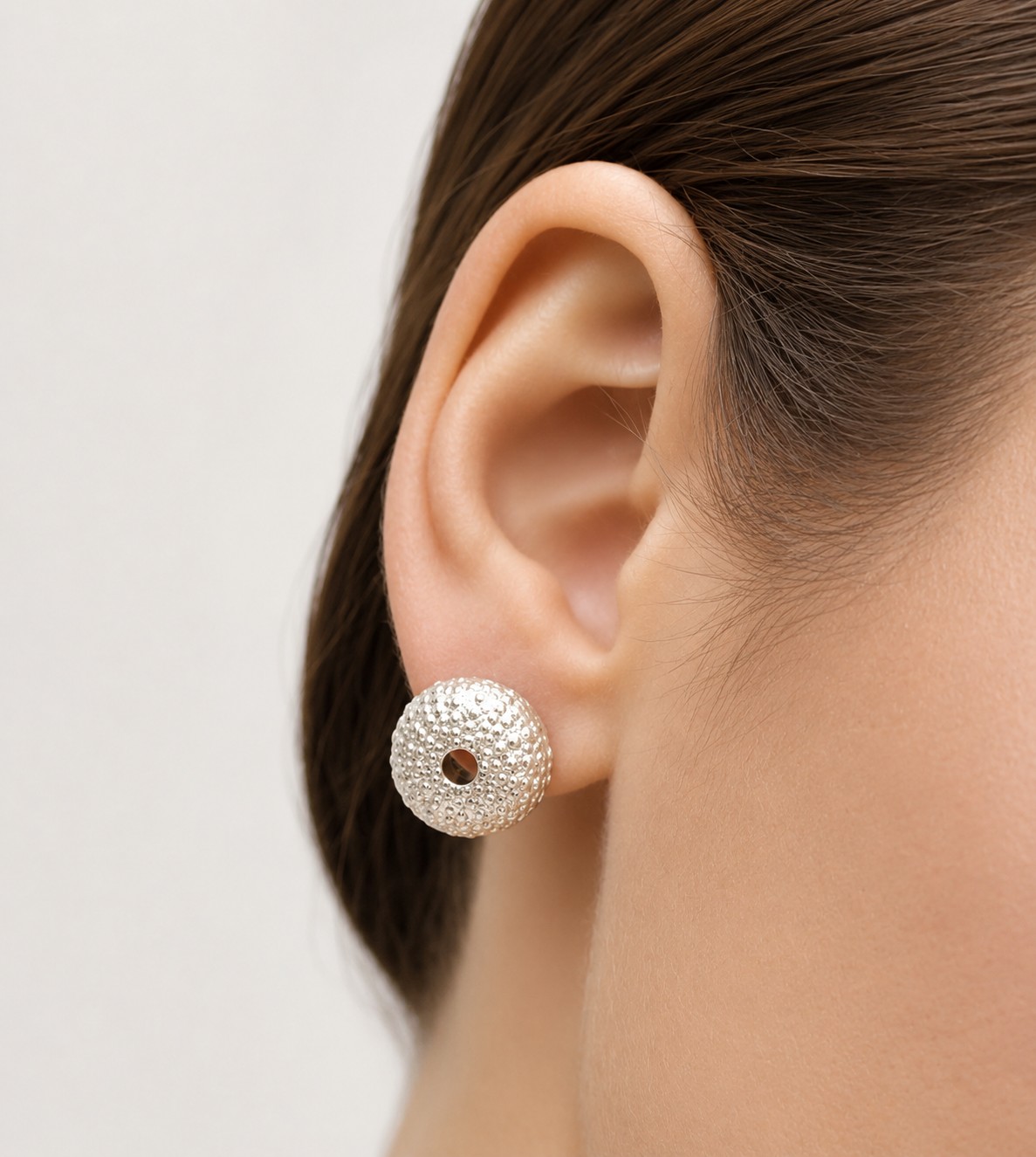 silver-sea-urchin-stud-earrings.jpg Handmade 925 sterling silver sea urchin stud earrings inspired by marine life.