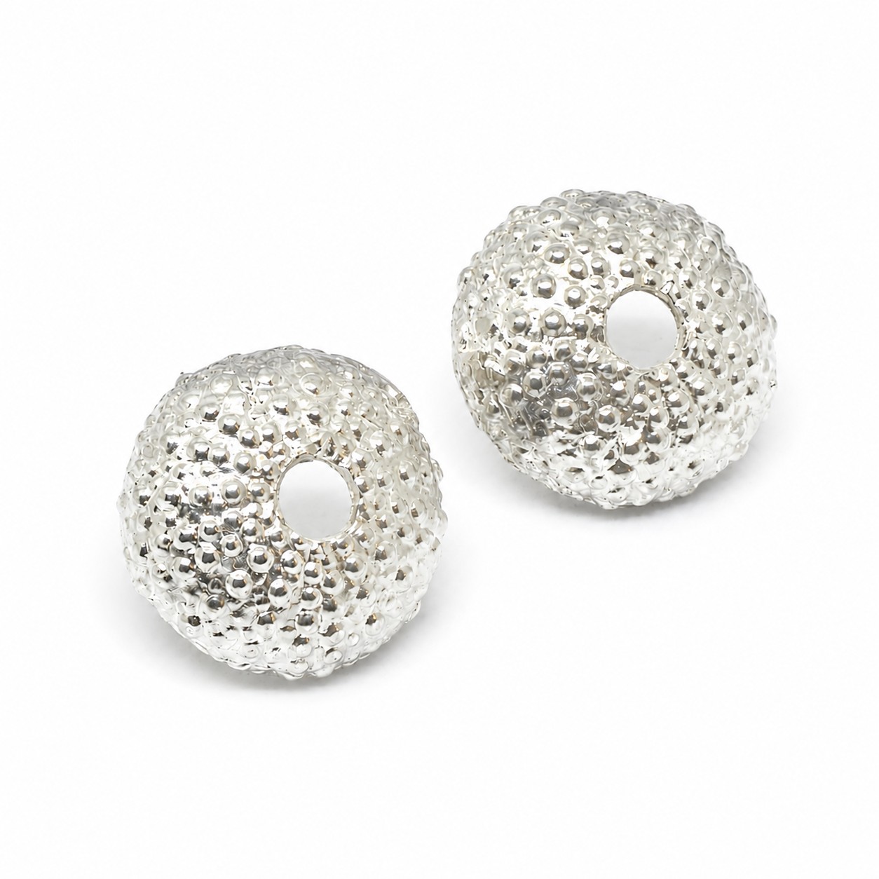 3e74e719-eec8-4401-bb17-46134a52c487 Handmade 925 sterling silver sea urchin stud earrings inspired by marine life.