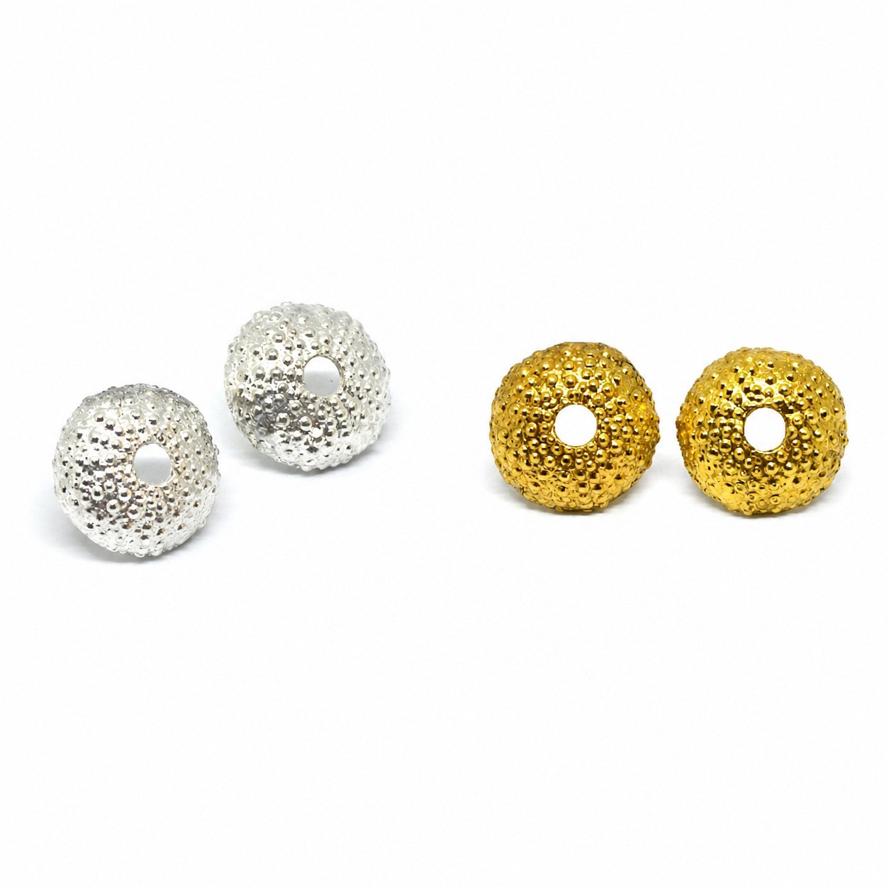 silver-sea-urchin-stud-earrings.jpg Handmade 925 sterling silver sea urchin stud earrings inspired by marine life.