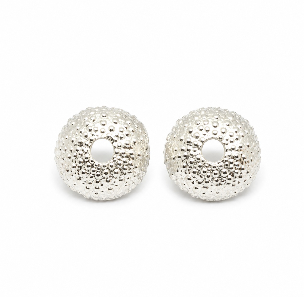 silver-sea-urchin-stud-earrings.jpg Handmade 925 sterling silver sea urchin stud earrings inspired by marine life.Handmade 925 sterling silver sea urchin stud earrings inspired by marine life.