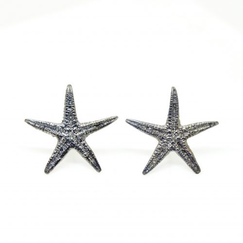 Oxidized sterling silver starfish stud earrings on white background