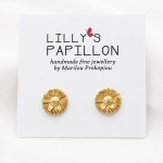 Gold sunflower stud earrings with floral design