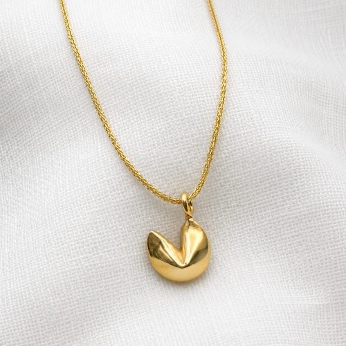 Gold fortune cookie pendant necklace on delicate gold cord