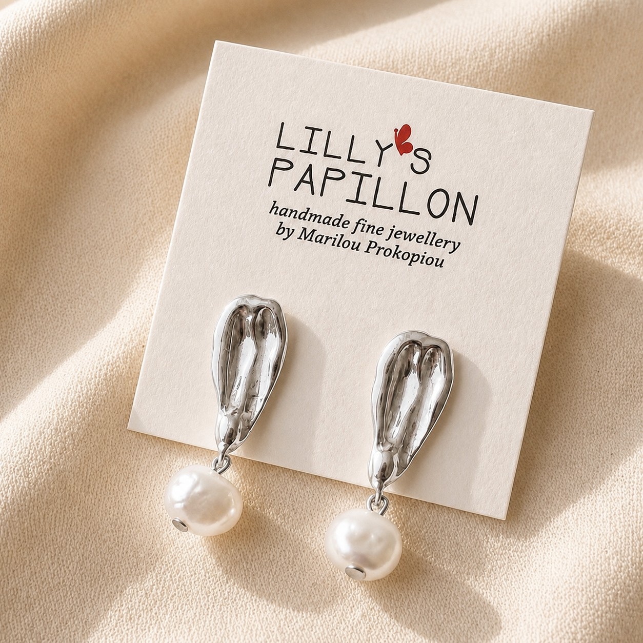 silver-pearl-drop-earrings silver pearl statement earrings with sculptural organic studs