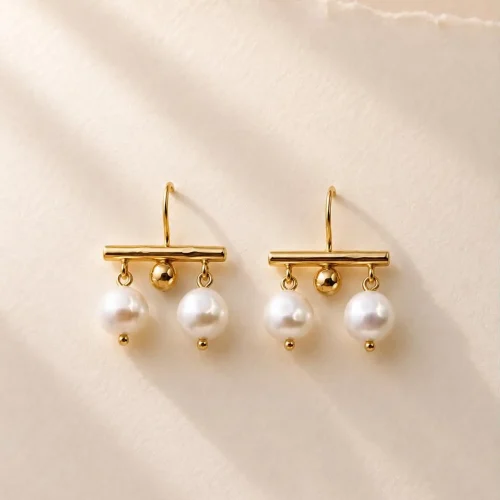 Modern gold pearl drop earrings with freshwater pearls
