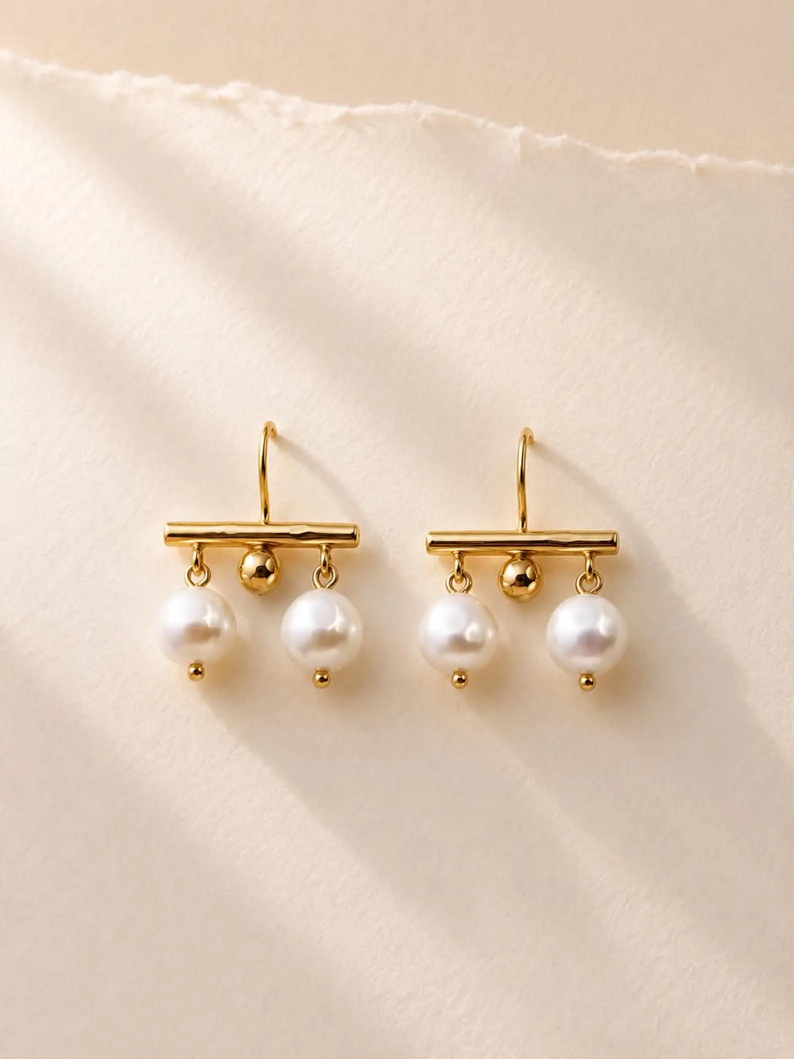 gold-pearl-drop-earrings Modern gold pearl drop earrings with freshwater pearls