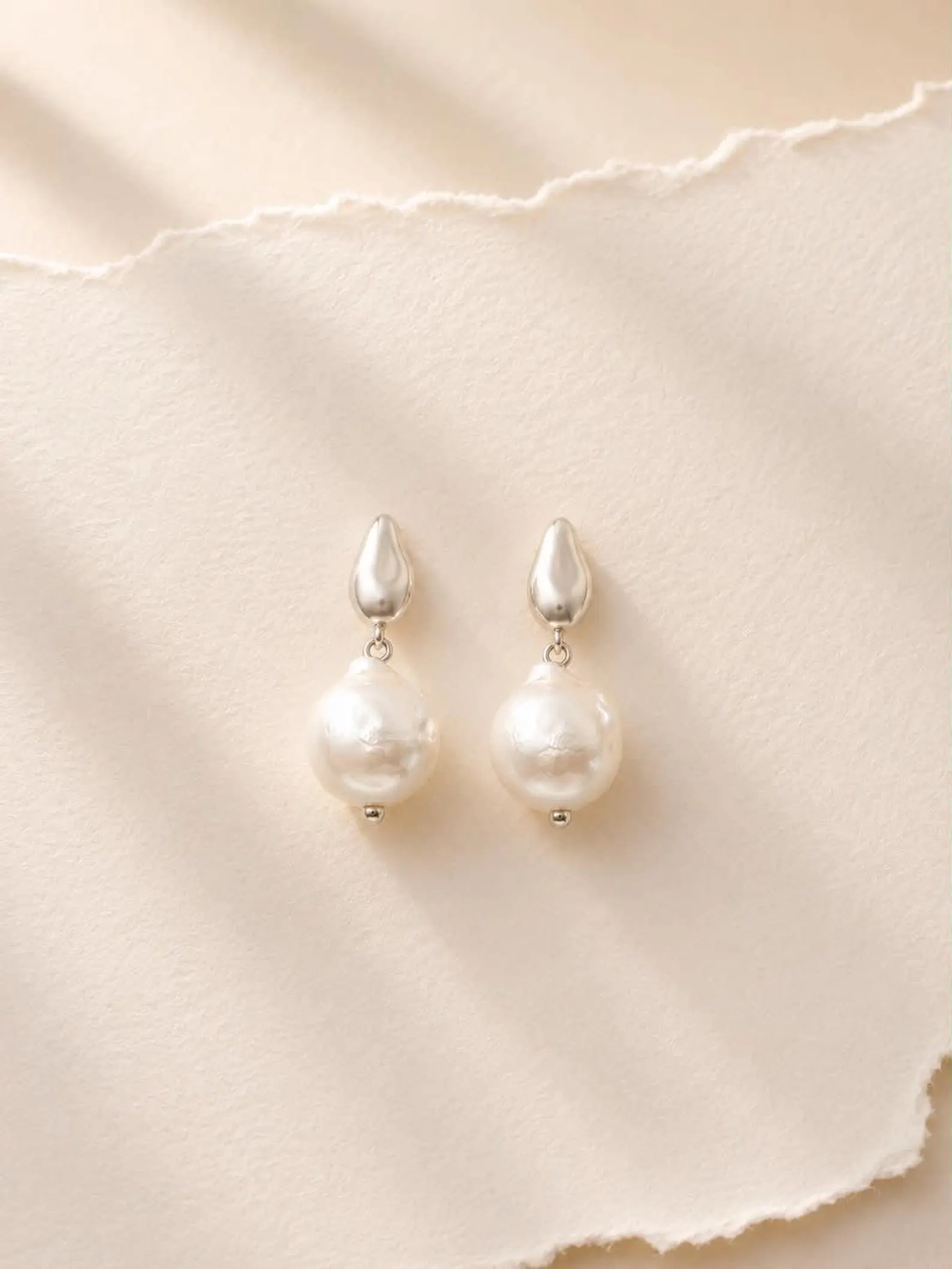 Silver-baroque-pearl-drop-earrings Silver baroque pearl drop earrings with freshwater pearls